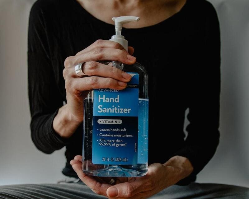 Woman Holding a Hand Sanitizer
