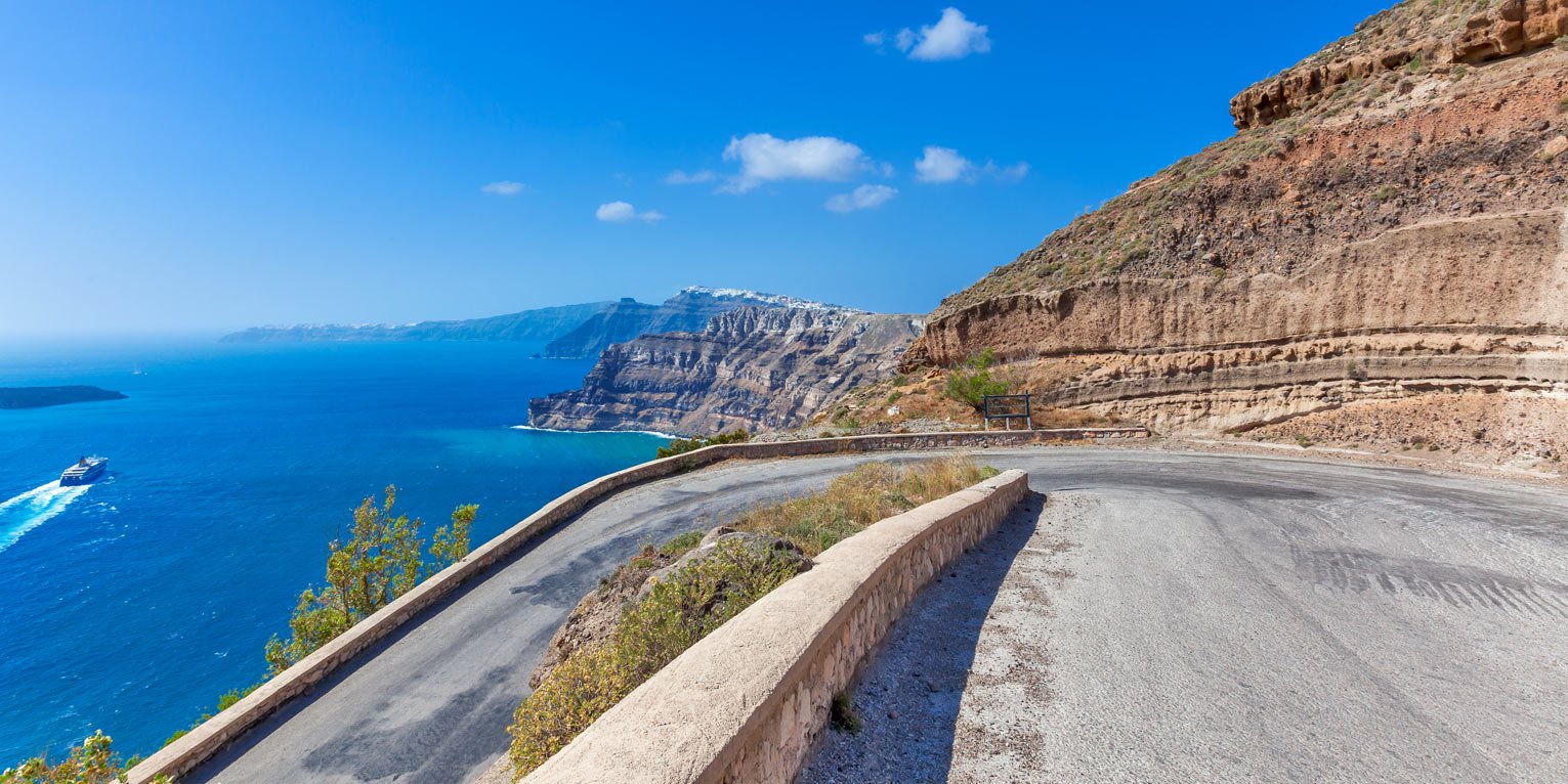 Drive in Santorini's roads with safety using a rented car from SantoriniCarHire.com