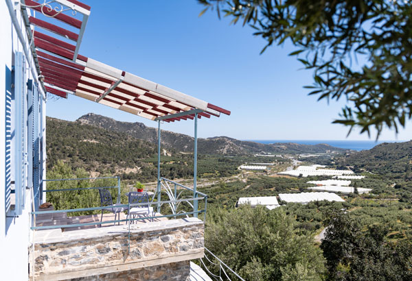 Sarakinas Residence, balcony with a table and panoramic view