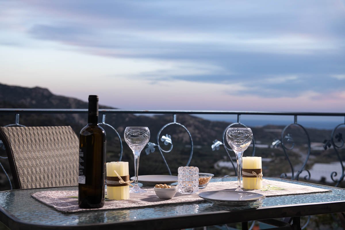 Sarakinas Residence, dining table in the balcony with a view