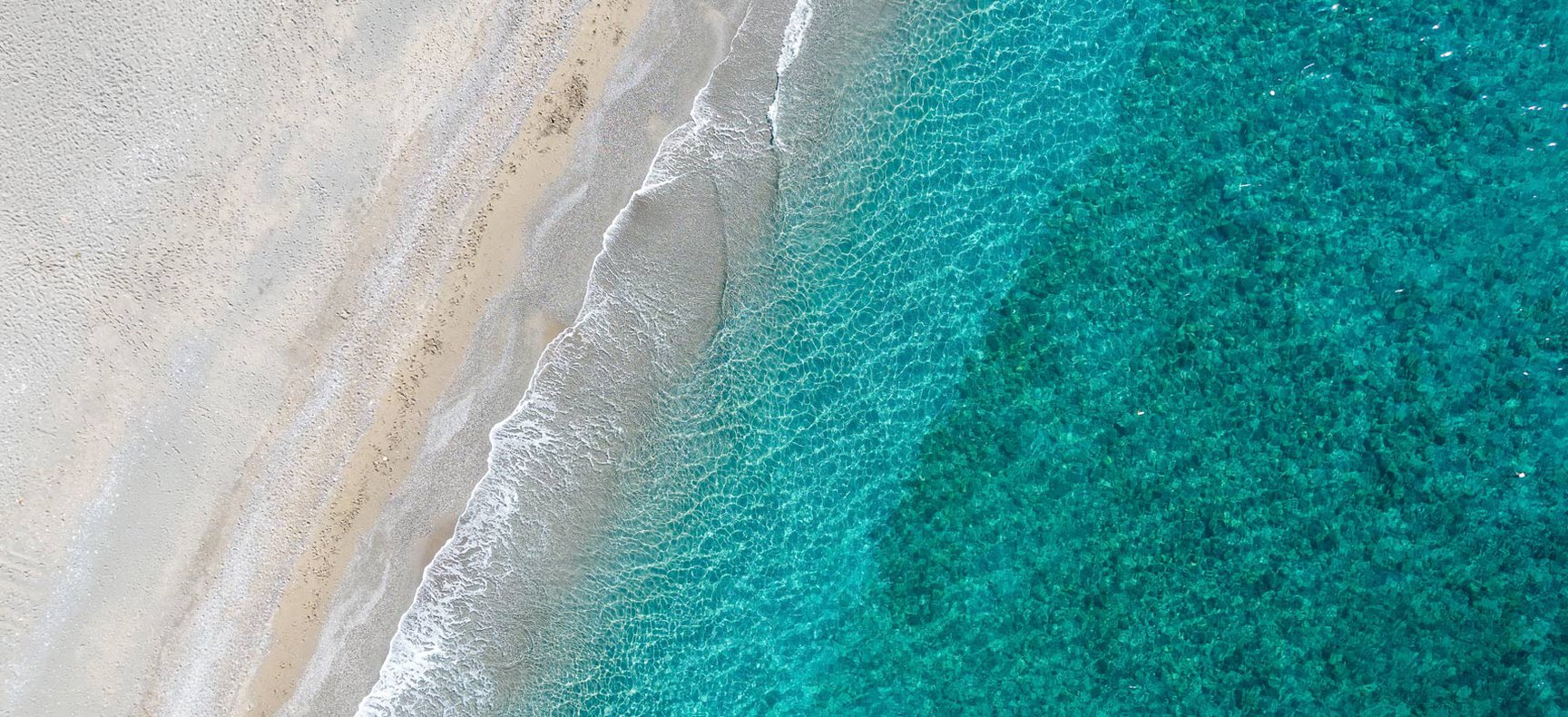 Beach with golden sand in Crete