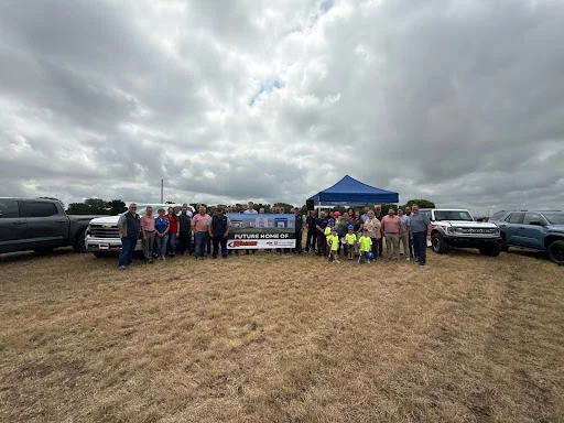 Wagner hardhats lined up on a truck tailgate