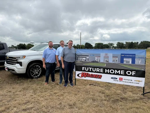 Wagner team gathered at the groundbreaking site