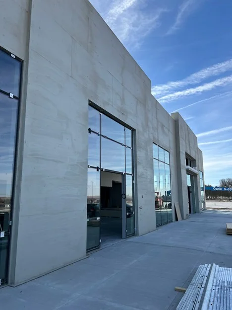 Showroom exterior with drywall going up