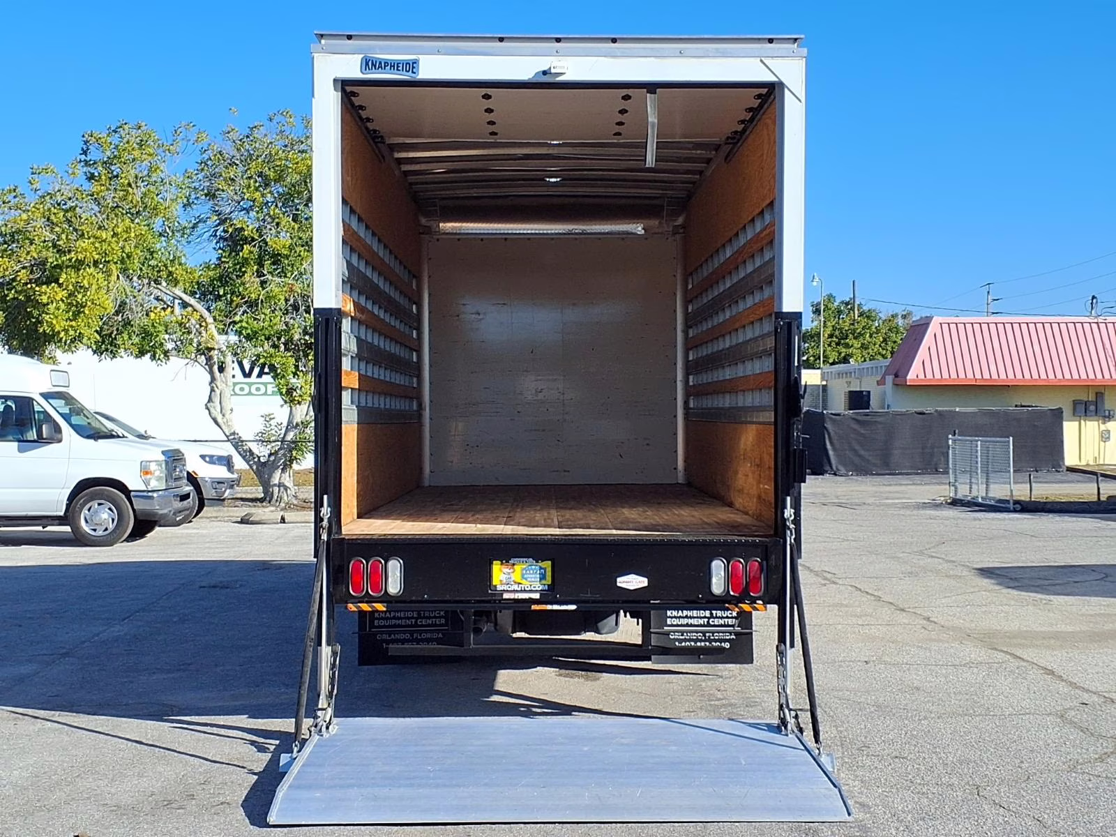 Isuzu NPR with a 16-foot dry van box body