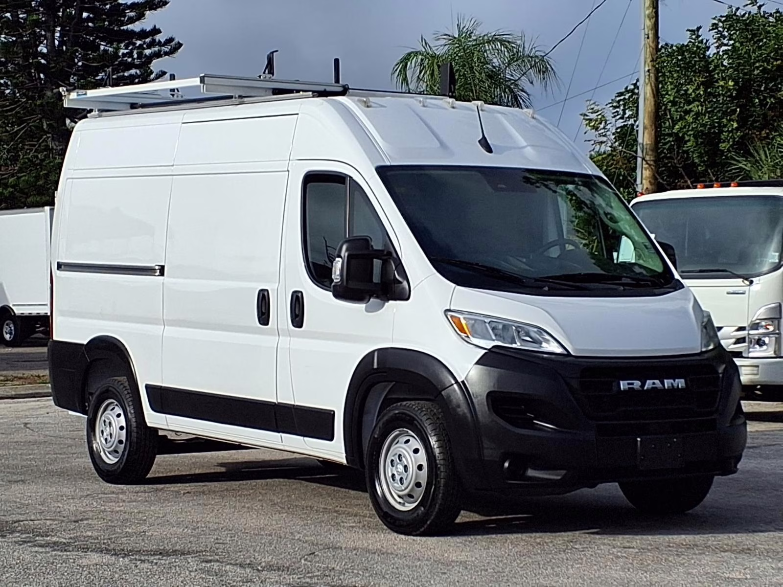 A white cargo van used for delivery services
