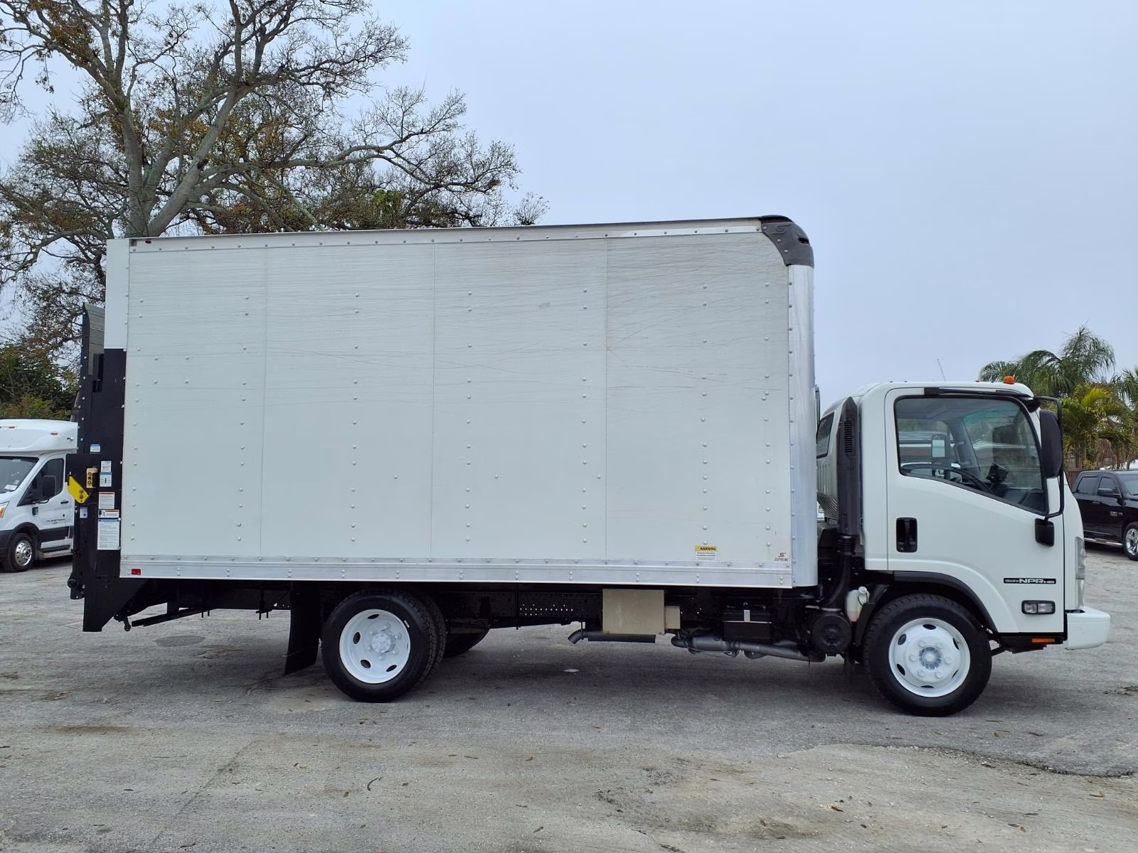 Comparison view from the driver seat showing superior visibility of a cab-over truck