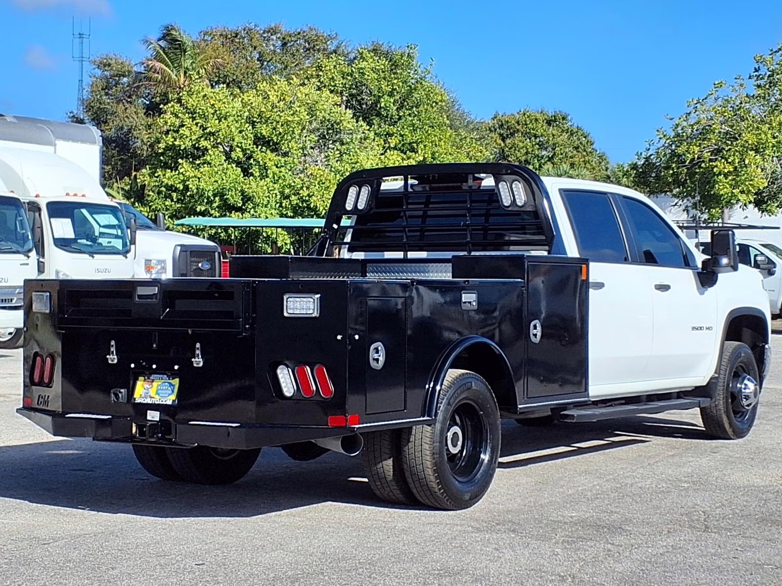 A preowned landscape dump truck ready for material hauling.