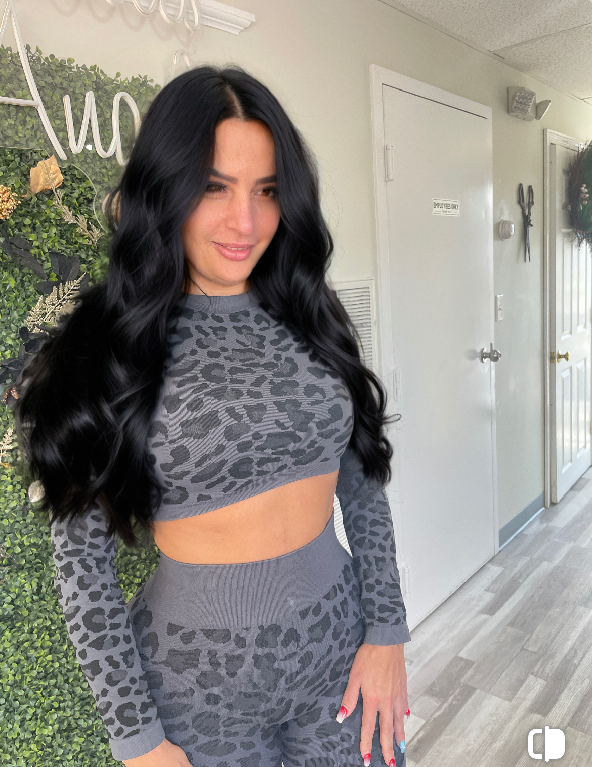 a model wearing black volume wefts