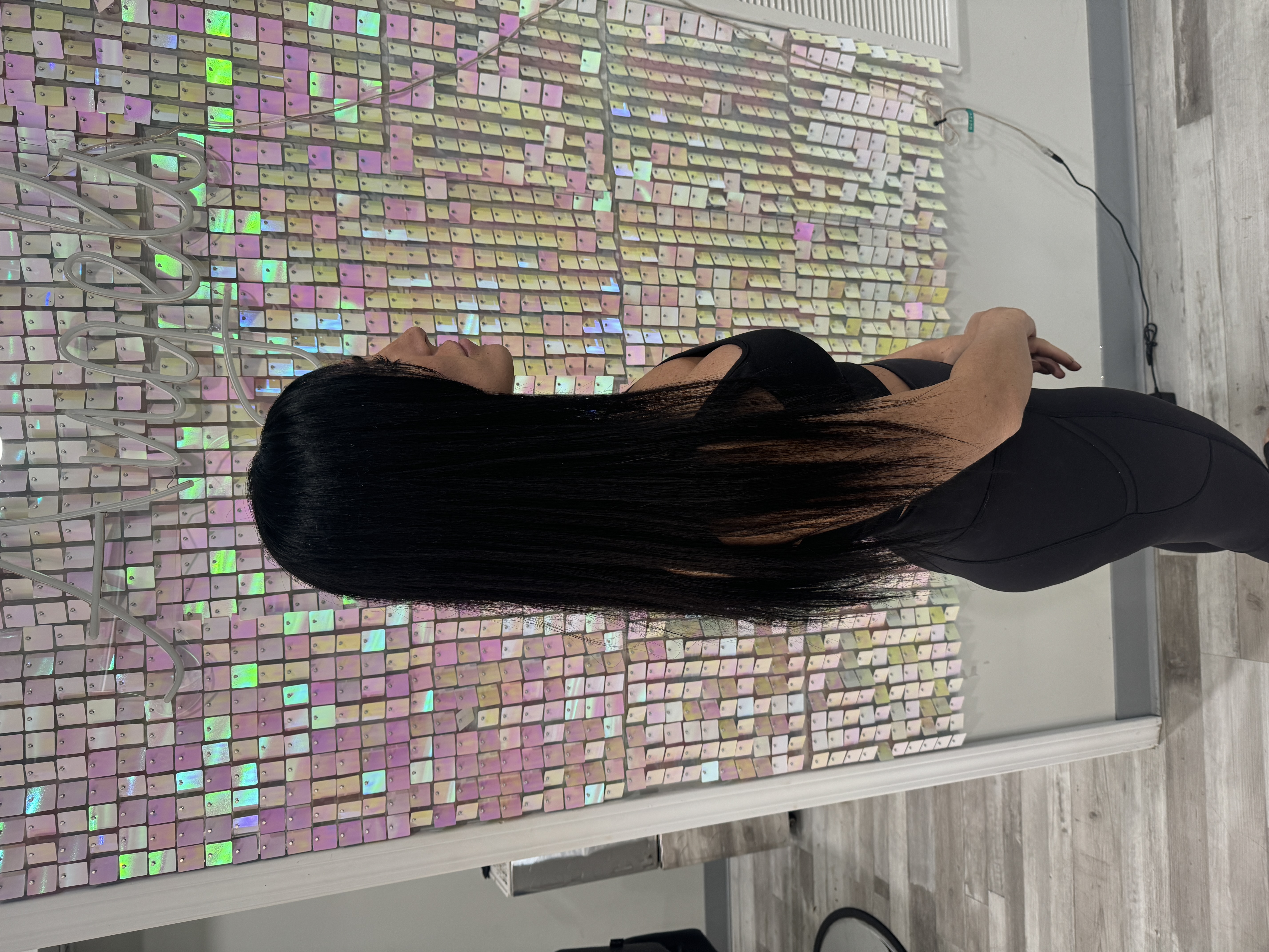a woman wearing a fresh washed human hair wig