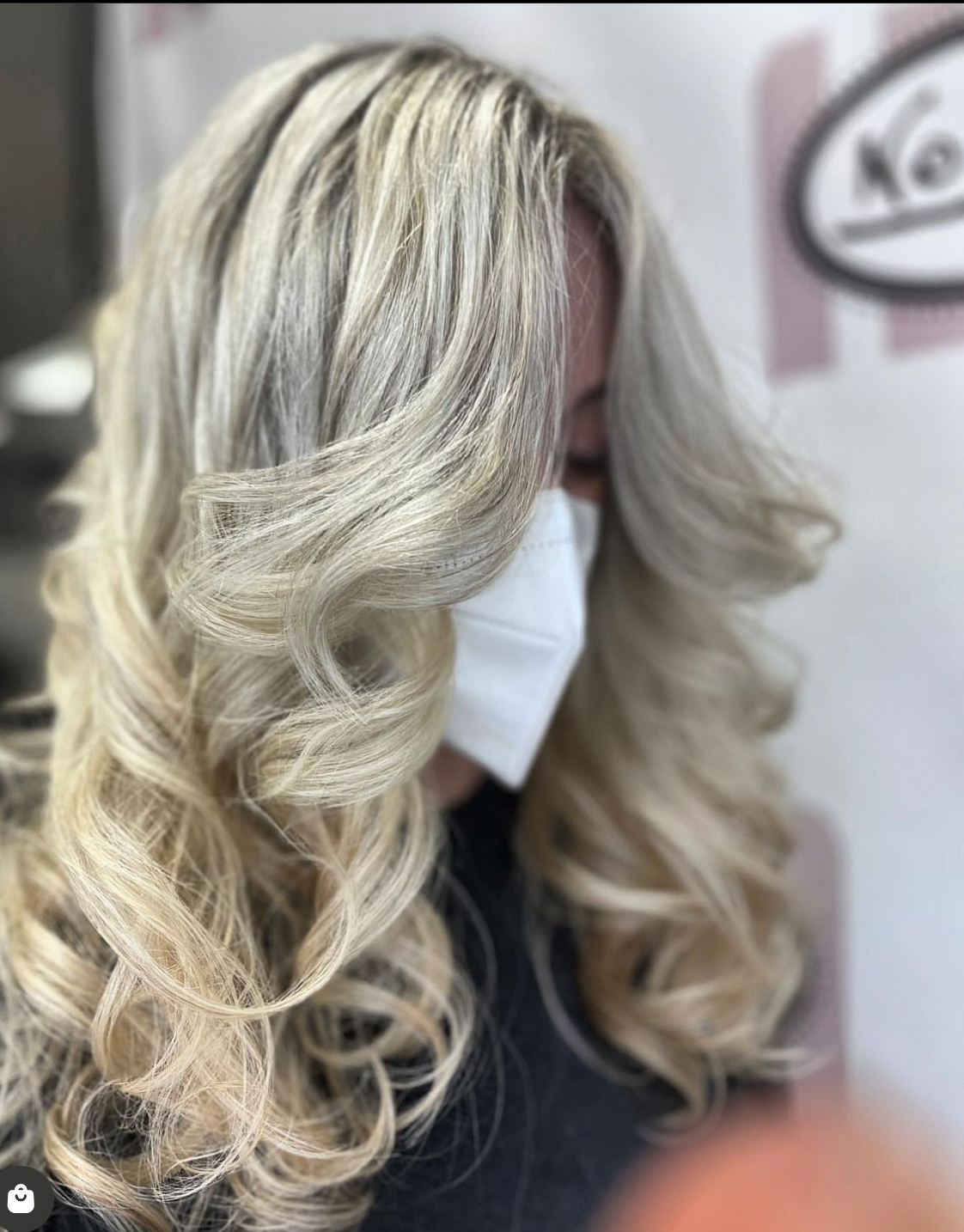 a woman with a wavy perm