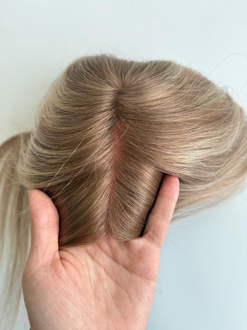 a human hair topper at Noelle Salon for partial hair loss