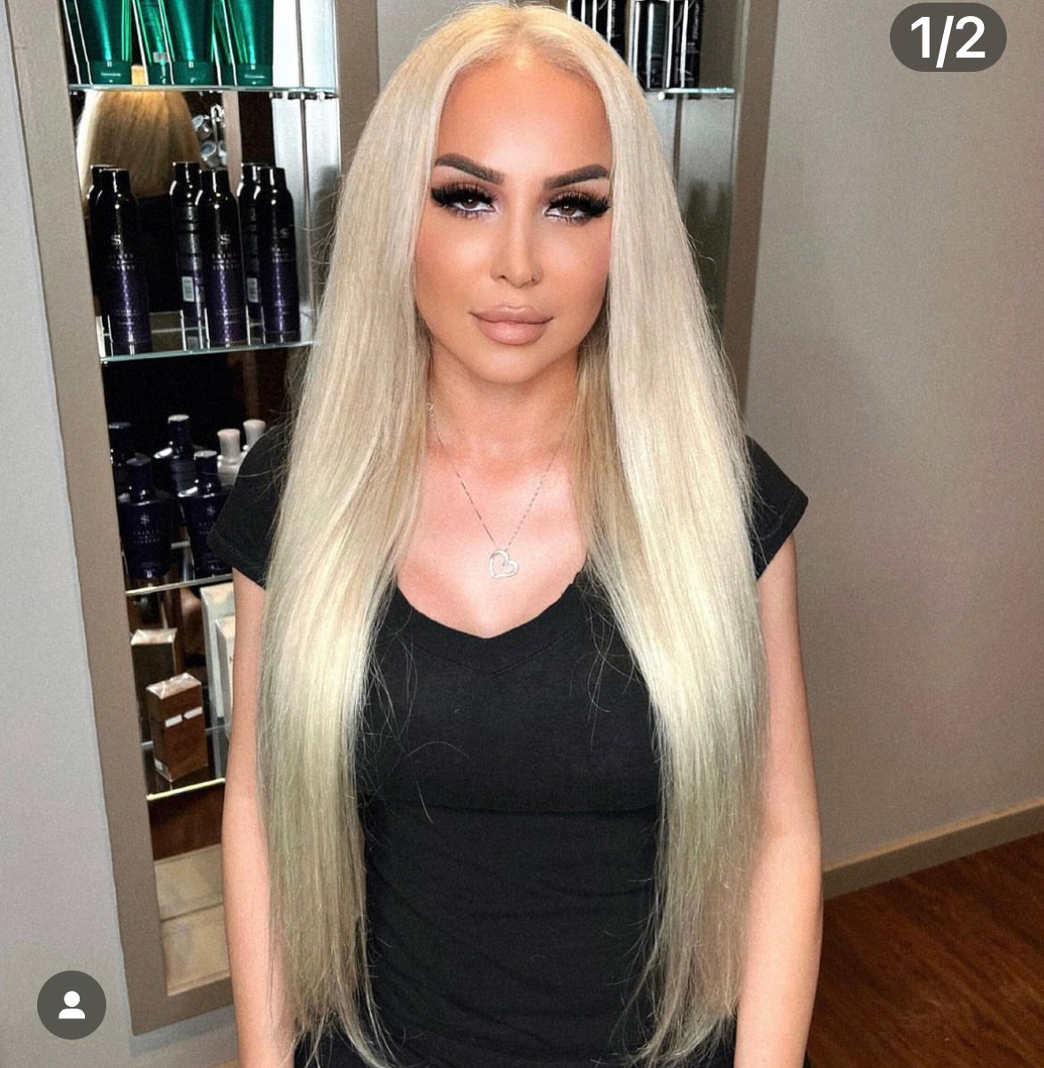 a woman wearing blonde hair extensions