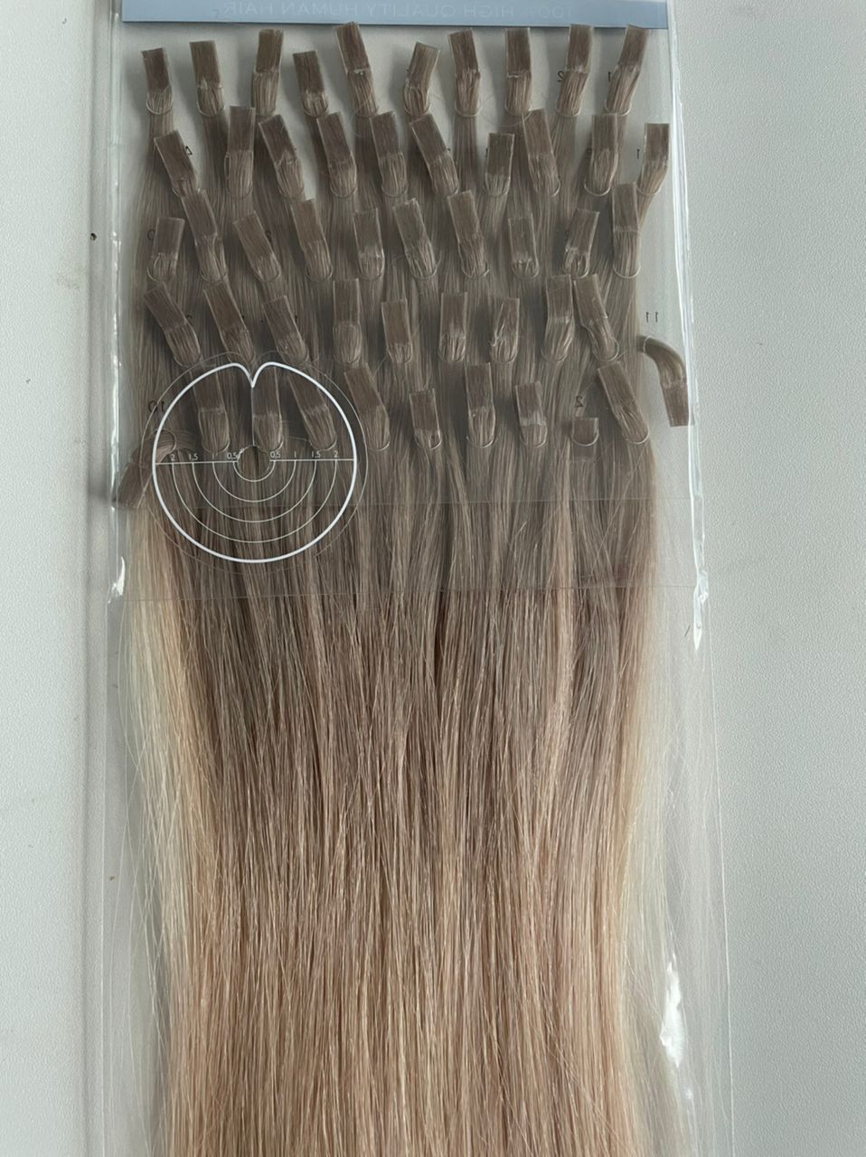 a pack of 22" balayage k-tip hair extensions