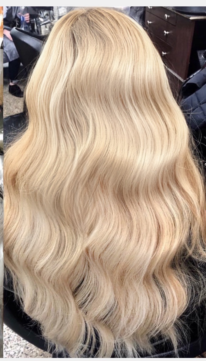 a photo of a blonde virgin remy hair topper in 18 inch length