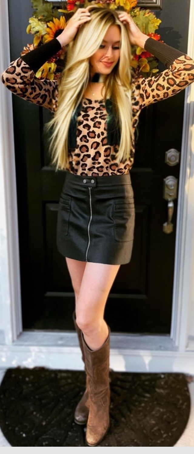 a woman wearing long blonde ICE hair extensions
