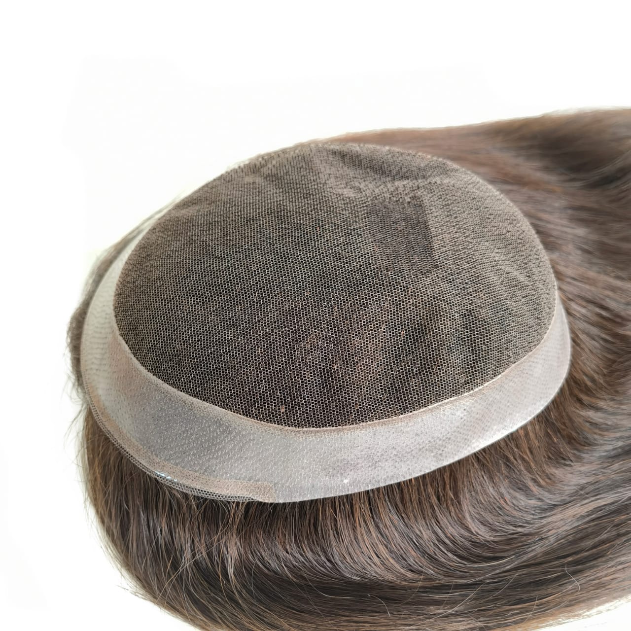 a hair topper for hair loss at Noelle Salon for a client with an insurance plan that covers hair loss solutions
