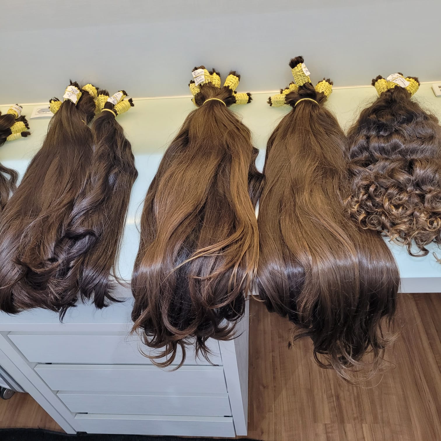 a picture of virgin hair extensions used to make a custom wig