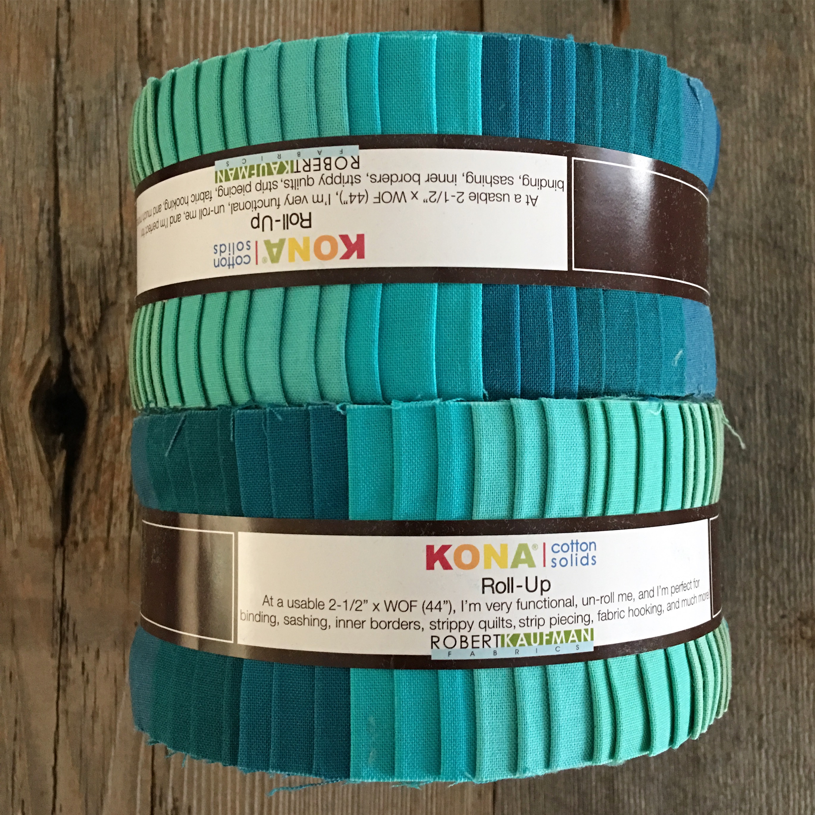 Kona cotton jelly roll bundles in teals