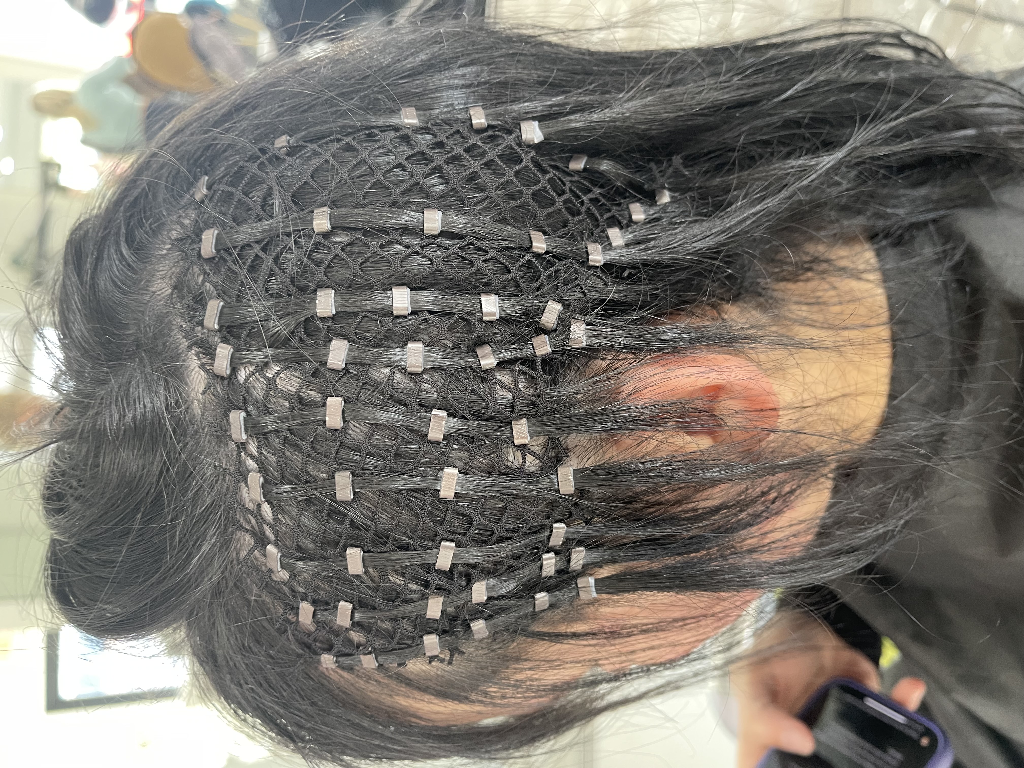 a mesh integration hair system for trichotillomania