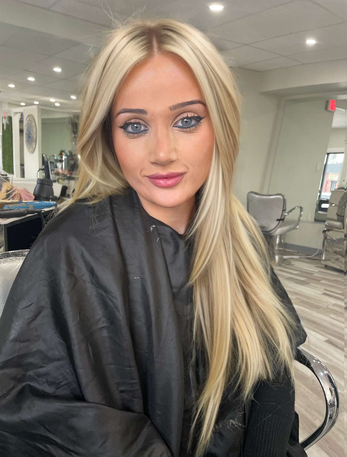 a blonde hair woman with lots of hair extensions