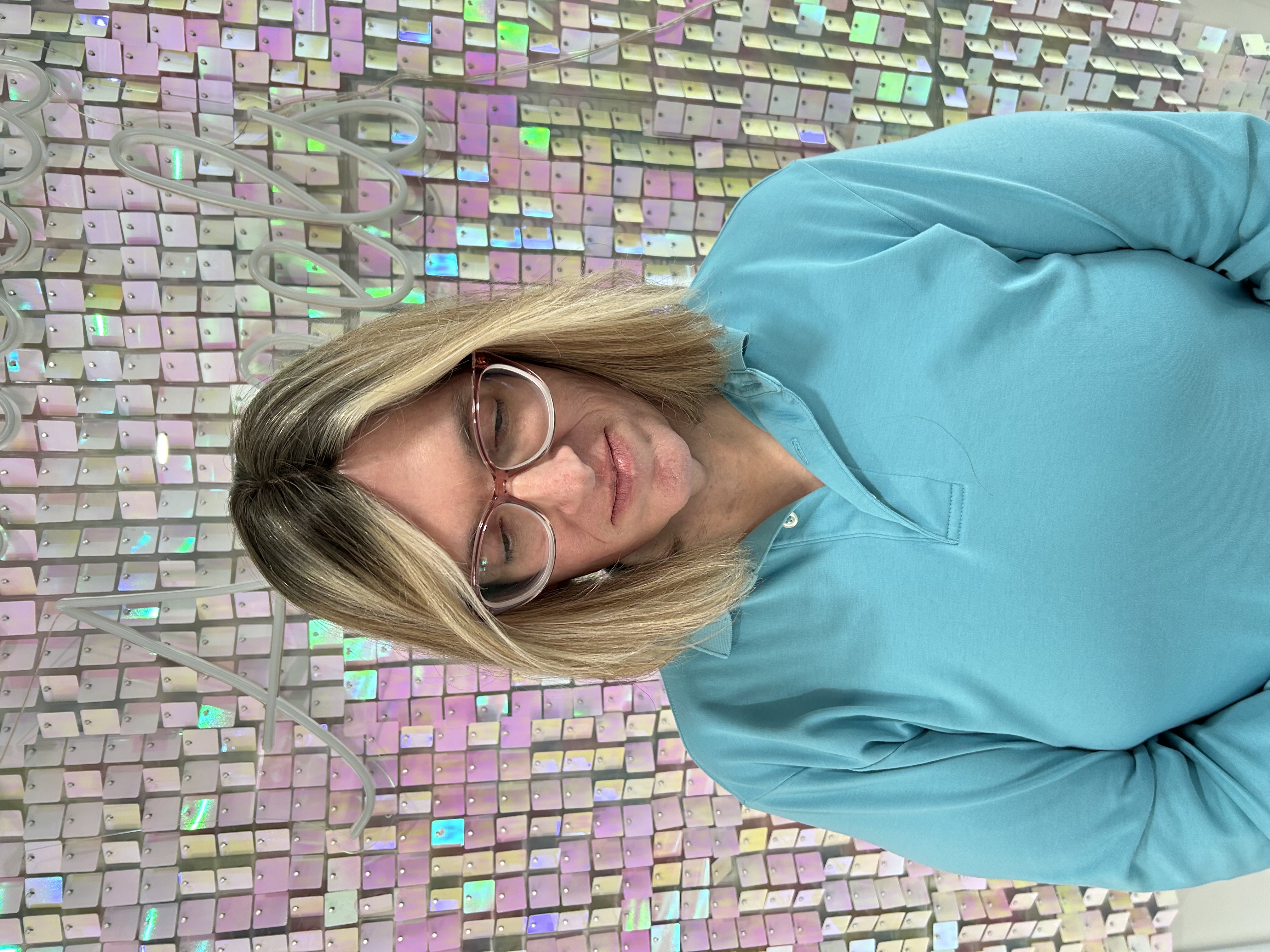 a transwoman wearing a human hair wig