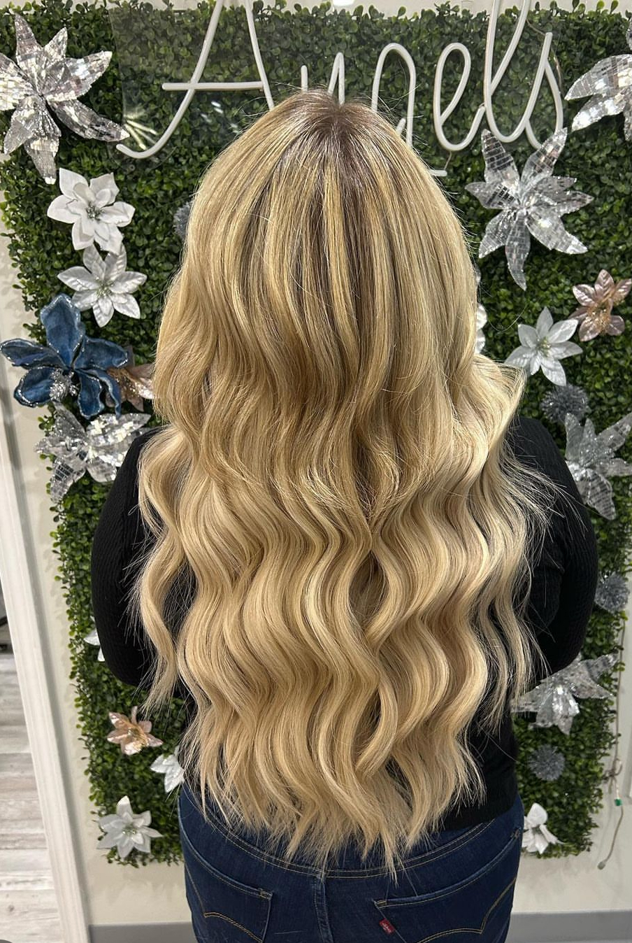 a photo of a woman wearing wavy volume wefts