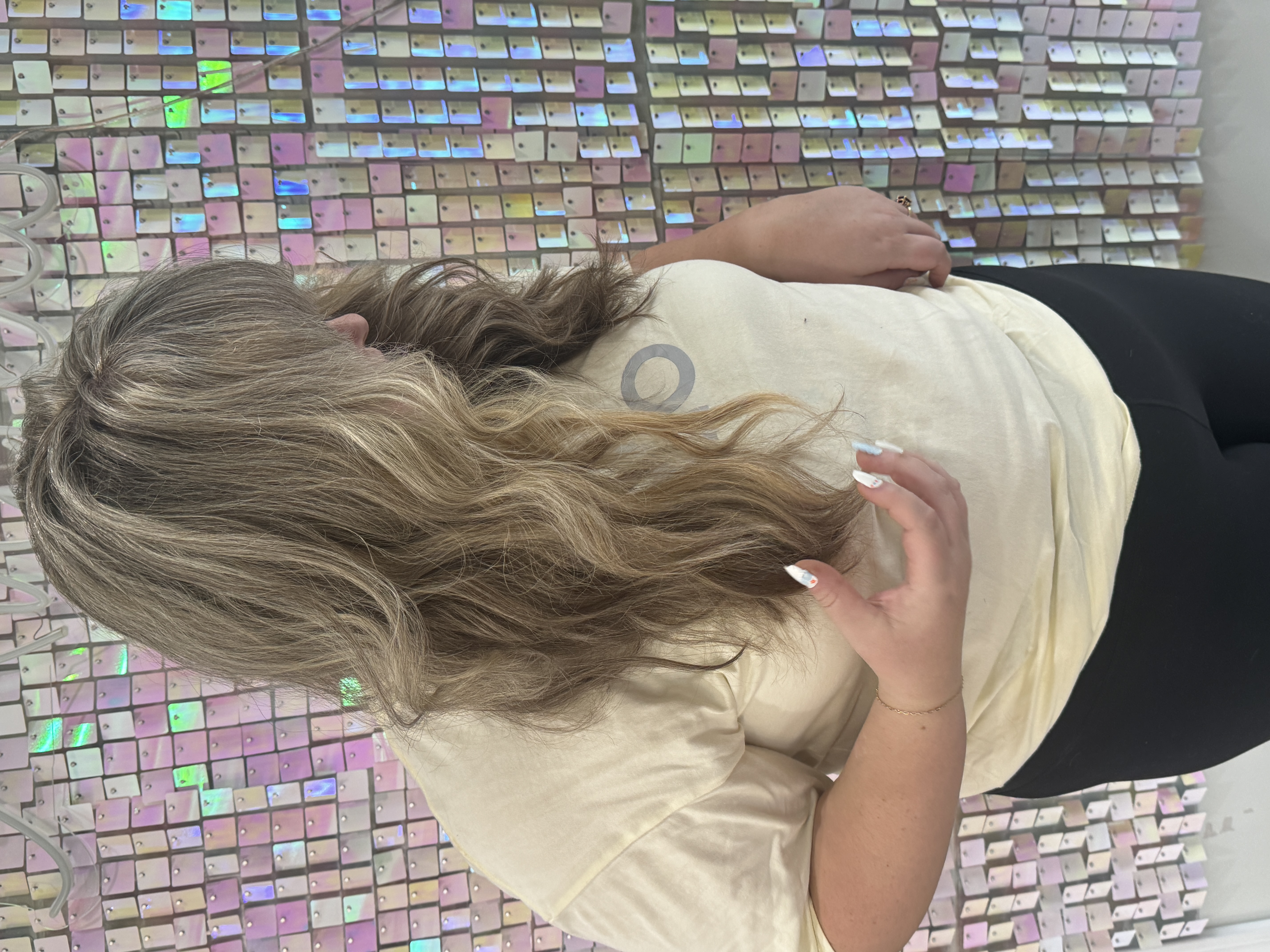A woman with Sabrina Carpenter Style Bangs