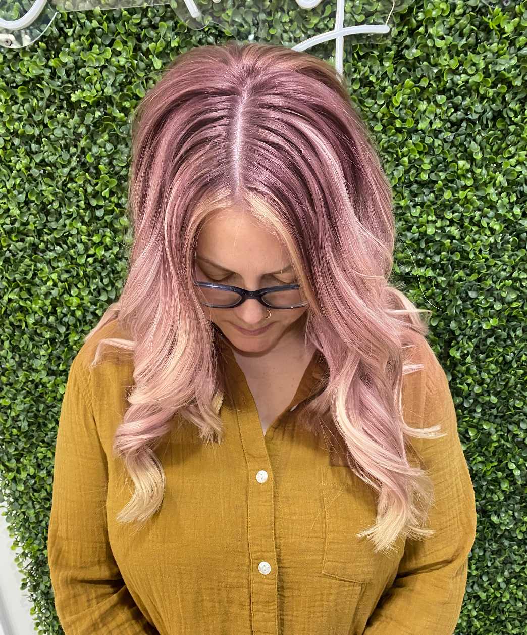 a woman wearing an ombre blush transition color