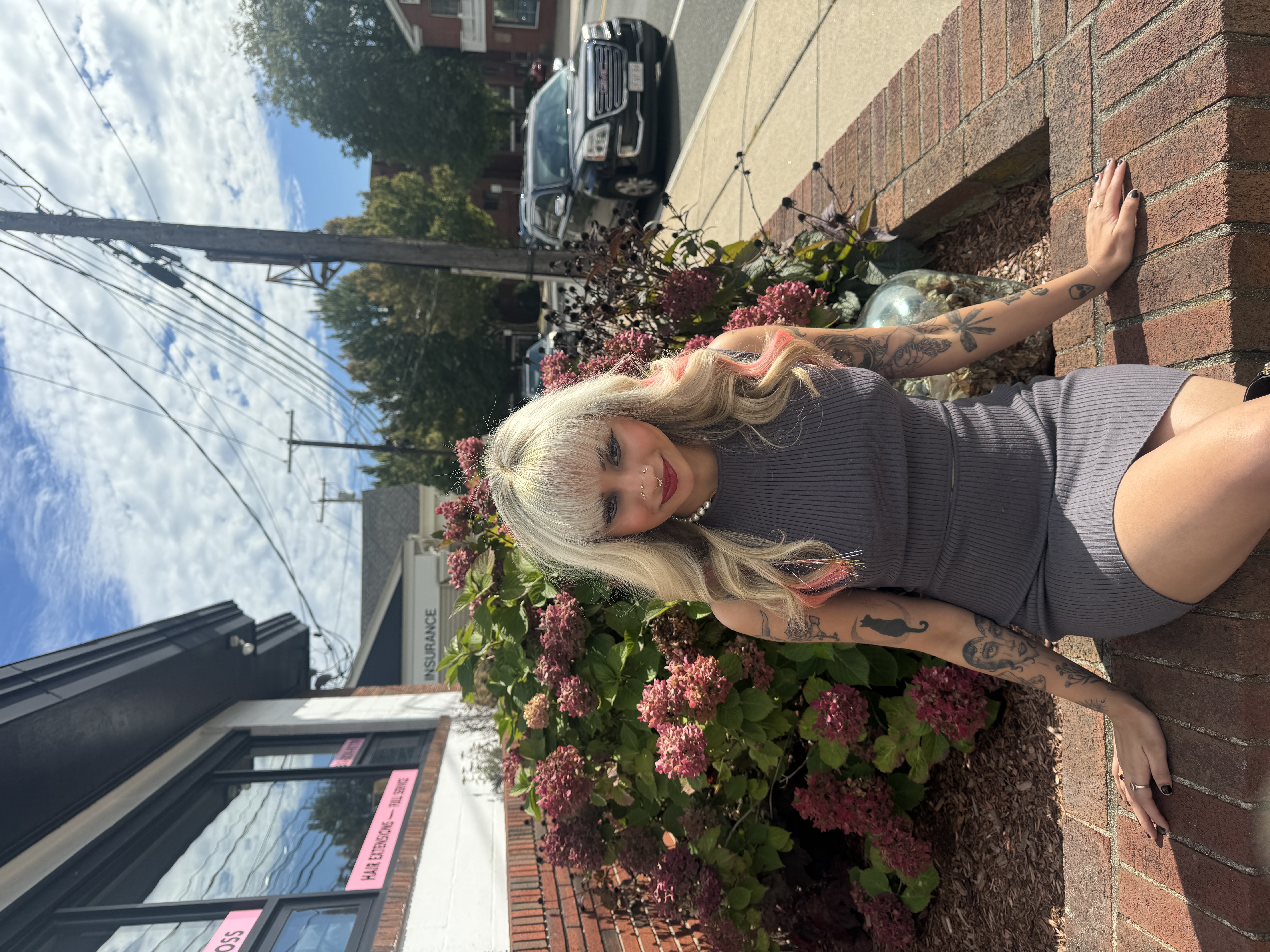 a woman wearing v light hair extensions to thicken her bangs