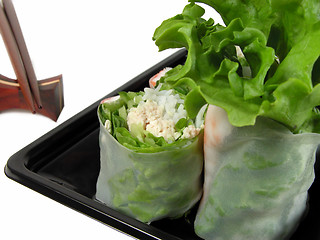 Image showing Vegetables rolls and chopsticks