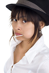 Image showing young woman with lollipop