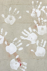 Image showing handprints on cement
