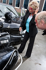 Image showing Inspecting damage