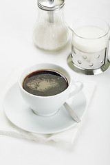 Image showing Coffee with sugar and milk