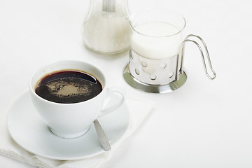 Image showing Coffee with milk and sugar