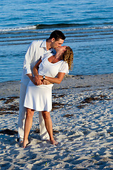 Image showing Young couple are kissing.