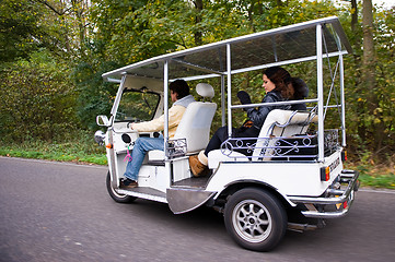 Image showing Solar powered tuc tuc on the road