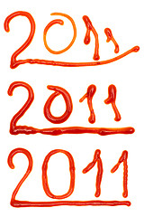 Image showing 2011 written in ketchup 