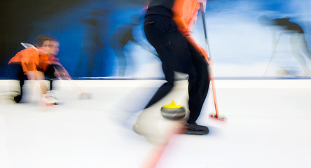Image showing Delivering a curling stone