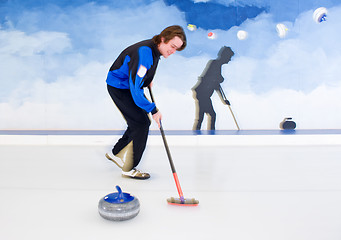 Image showing Curling brooming