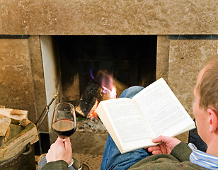 Image showing Relaxing by the fire