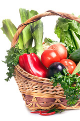 Image showing basket with vegetables isolated on white 