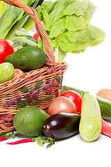 Image showing basket with vegetables isolated on white 