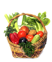 Image showing basket with vegetables isolated on white 