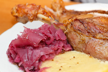 Image showing roasted duck with red cabbage and dumplings