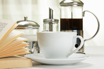 Image showing Coffee set and book