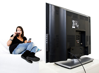 Image showing Woman watching TV