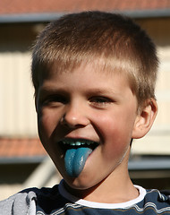 Image showing Boy with Blue Tongue