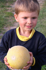 Image showing Child and Melon